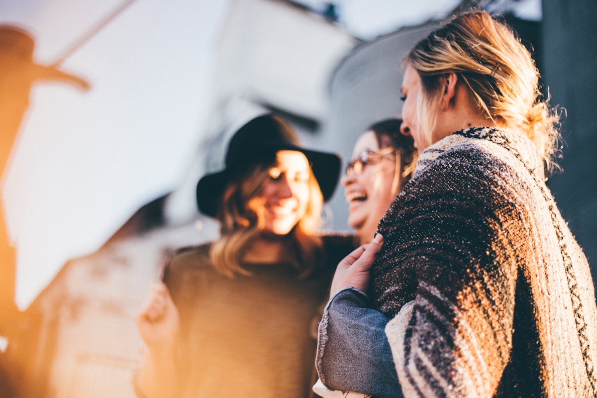 Group of fashionable women laughing